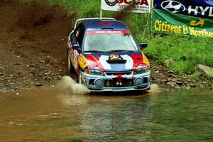 Alec Ellsworth /	Steve Kaczkowski Mitsubishi Lancer Evo IV at the flying finish of Stony Crossing, SS1.