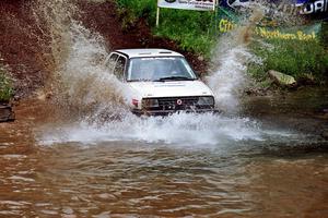 Eric Burmeister / Rob Dupree VW GTI comes through the spectator area at Phasa, SS4.