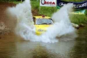 Padraig Purcell / John McCafferty Vauxhall Astra GSi at the flying finish of Stony Crossing, SS1.