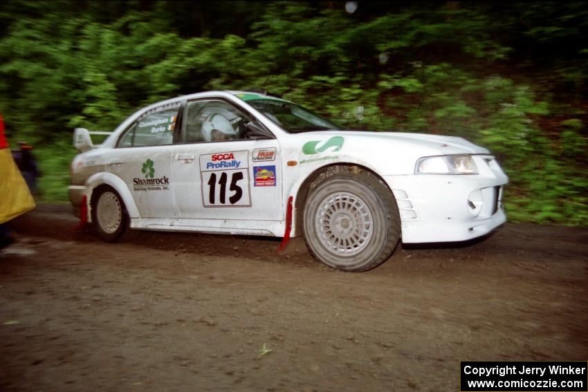 Seamus Burke / Frank Cunningham Mitsubishi Lancer Evo VI at the start of the rainy Friday practice stage.