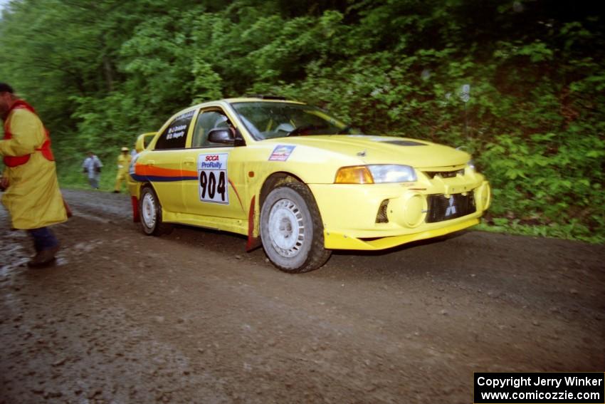 John Drislane / Declan Hegarty Mitsubishi Lancer Evo IV at the start of the rainy Friday practice stage.