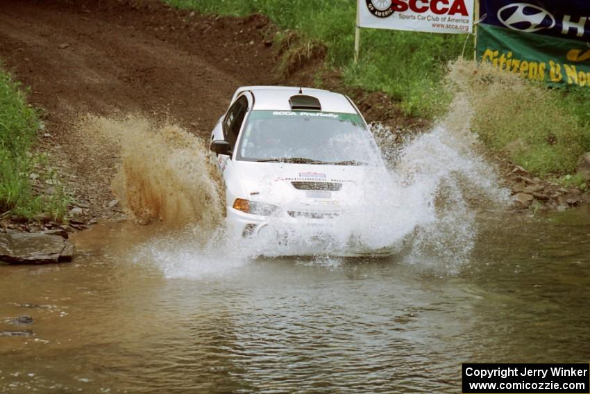 Tom Lawless / Brian Sharkey Mitubishi Lancer Evo IV at the flying finish of Stony Crossing, SS1.