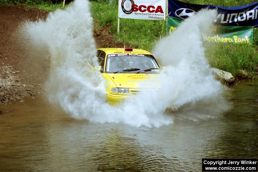 Padraig Purcell / John McCafferty Vauxhall Astra GSi at the flying finish of Stony Crossing, SS1.