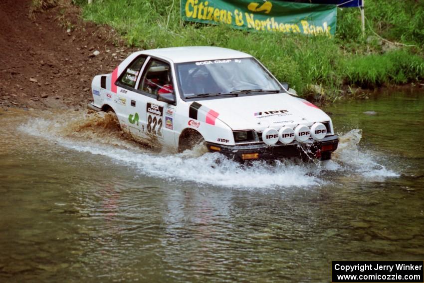 Jeff Field / Dave Weiman Dodge Shadow at the flying finish of Stony Crossing, SS1.