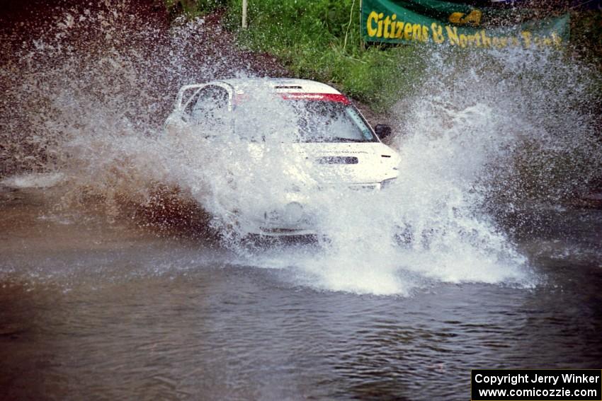 Paul Dunn / Rebecca Dunn Mitsubishi Lancer Evo IV at the flying finish of Stony Crossing, SS1.