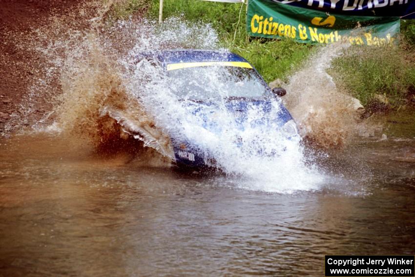 Craig Peeper / Ian Bevan Ford Focus at the flying finish of Stony Crossing, SS1.