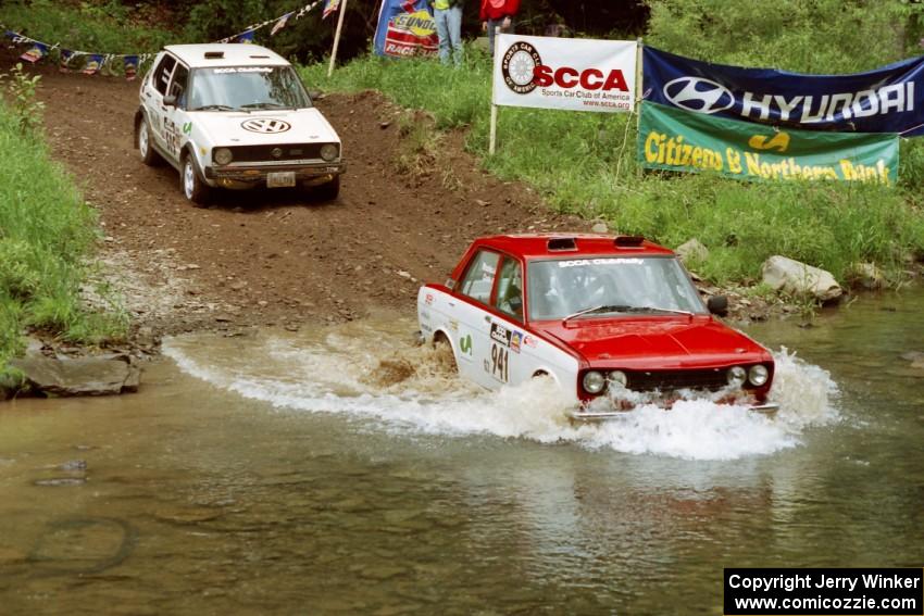 Dan Cook / Bill Rhodes Datsun 510 and Jon Hamilton / Josh Westhoven VW Rabbit at the flying finish of Stony Crossing, SS1.