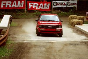 Jon Kemp / Gail McGuire Audi 4000 Quattro comes through the spectator area at Phasa, SS4.