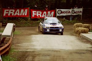 Ramana Lagemann / Russ Hughes Subaru Impreza comes through the spectator area at Phasa, SS4.