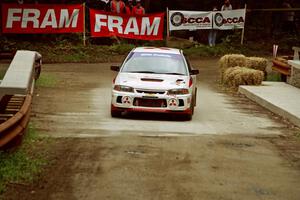 Vinnie Frontinan / Luis Teixeira Mitsubishi Lancer Evo IV comes through the spectator area at Phasa, SS4.