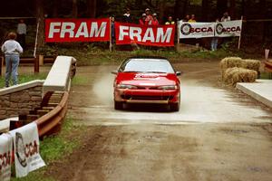 Mark Utecht / Brenda Lewis Mitsubishi Eclipse GSX comes through the spectator area at Phasa, SS4.