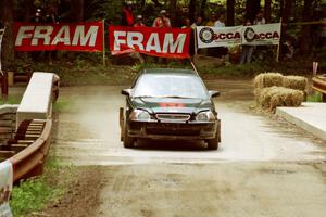 Nick Robinson / Jim Newton Honda Civic comes through the spectator area at Phasa, SS4.