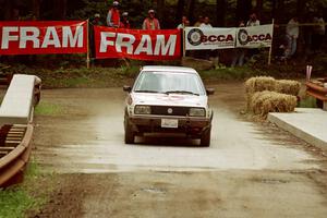 Tony Chavez / Doug Robinson VW GTI comes through the spectator area at Phasa, SS4.