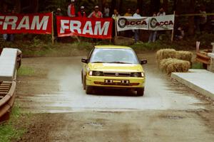 Dean Fry / Rick Davis Subaru Legacy comes through the spectator area at Phasa, SS4.