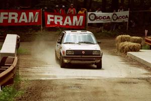 Eric Burmeister / Rob Dupree VW GTI comes through the spectator area at Phasa, SS4.