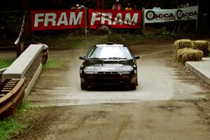 Dave Hintz / Rick Hintz Mazda RX-7 comes through the spectator area at Phasa, SS4.