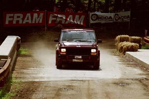 Scott Carlborn / Dale Dewald Jeep Comanche comes through the spectator area at Phasa, SS4.