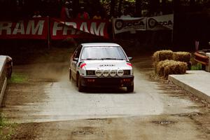 Jeff Field / Dave Weiman Dodge Shadow comes through the spectator area at Phasa, SS4.