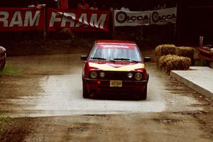 Dmitri Kishkarev / Scott Comens VW GTI comes through the spectator area at Phasa, SS4.