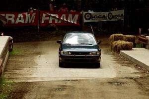 Don Kennedy / Matt Kennedy Subaru Impreza comes through the spectator area at Phasa, SS4.