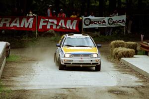Brad Hawkins / Adrian Wintle VW GTI comes through the spectator area at Phasa, SS4.