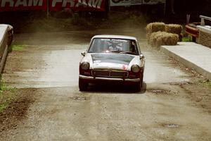 Phil Smith / Dallas Smith MGB-GT comes through the spectator area at Phasa, SS4.