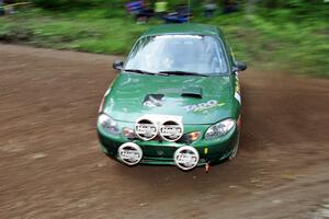 Tad Ohtake / Martin Dapot Ford Escort ZX2 at the first hairpin on Colton Stock, SS5.