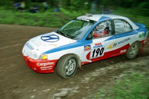 Malachy Crawford / Mark McAllister Hyundai Elantra at the first hairpin on Colton Stock, SS5.