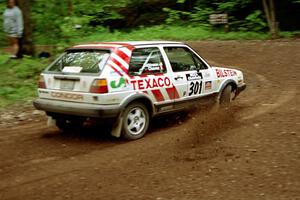 Tony Chavez / Doug Robinson VW GTI at the first hairpin on Colton Stock, SS5.