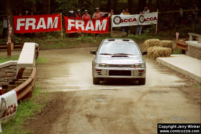 Russ Hodges / Mark Buskirk Subaru WRX comes through the spectator area at Phasa, SS4.