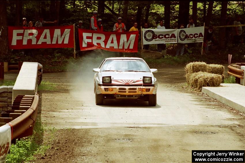 Mark Bowers / Sumit Panjabi Mitsubishi Starion comes through the spectator area at Phasa, SS4.