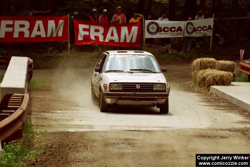 Eric Burmeister / Rob Dupree VW GTI comes through the spectator area at Phasa, SS4.