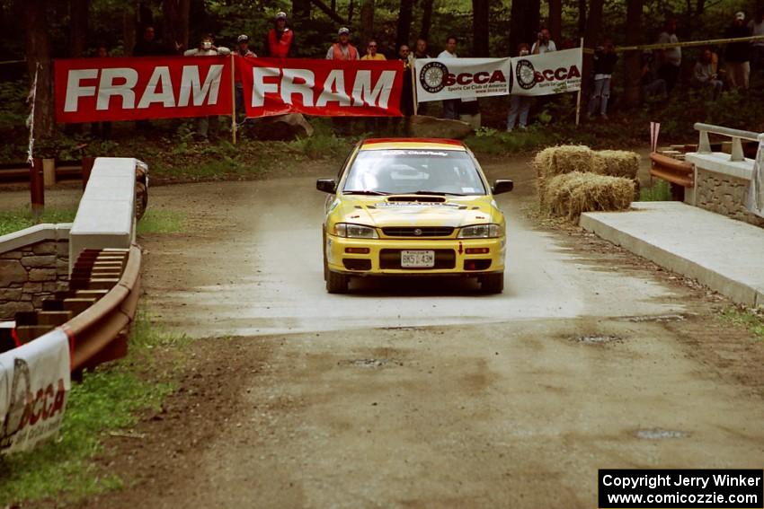 Randy Zimmer / Peter Watt Subaru Impreza comes through the spectator area at Phasa, SS4.