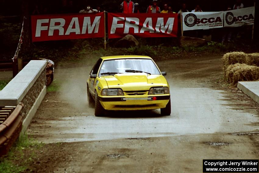Don Rathgeber / D.J. Bodnar Ford Mustang comes through the spectator area at Phasa, SS4.