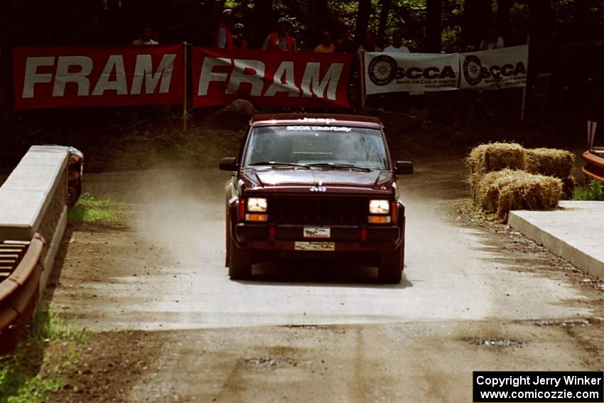 Scott Carlborn / Dale Dewald Jeep Comanche comes through the spectator area at Phasa, SS4.