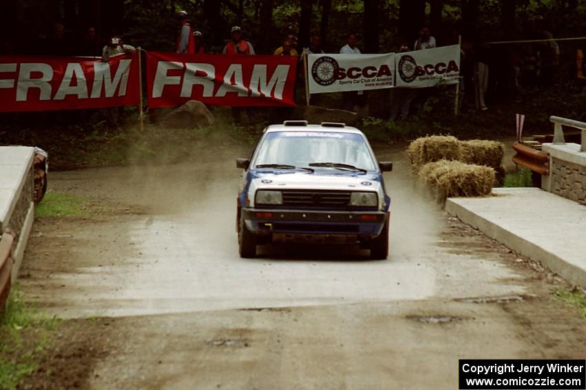 Chris Whiteman / Mike Paulin VW GTI comes through the spectator area at Phasa, SS4.