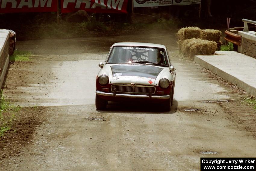 Phil Smith / Dallas Smith MGB-GT comes through the spectator area at Phasa, SS4.