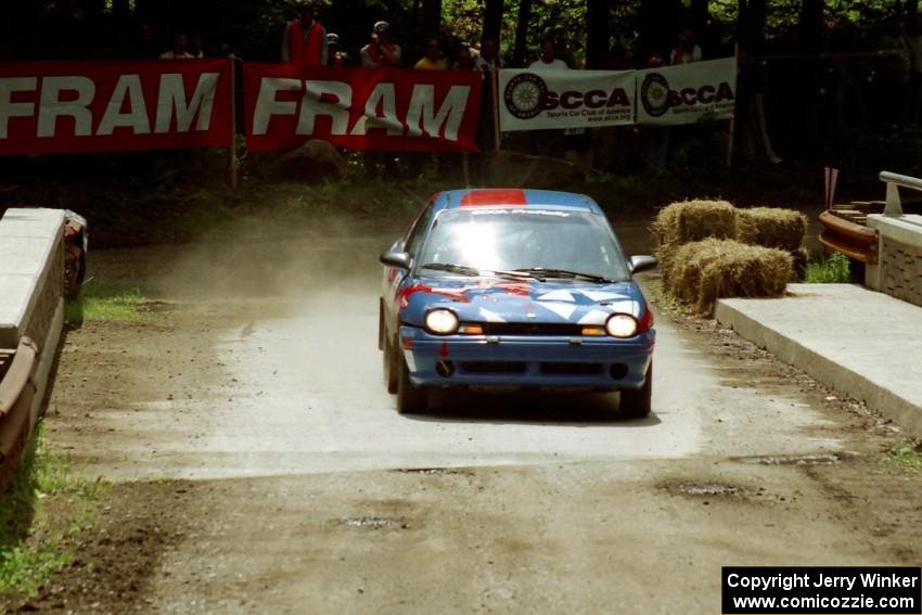 Tom Young / Jim LeBeau Dodge Neon ACR comes through the spectator area at Phasa, SS4.