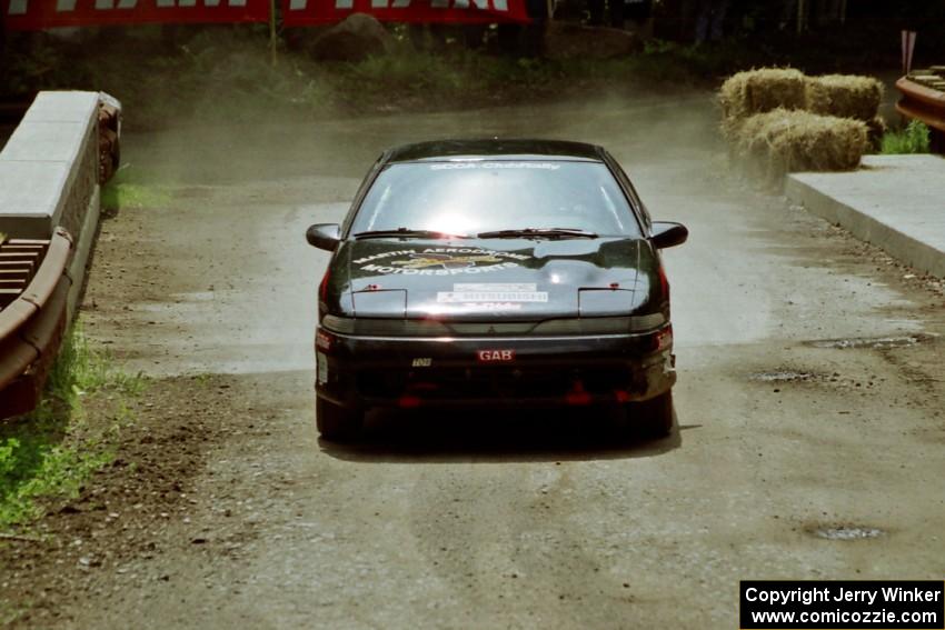 Dennis Martin / Chris Plante Mitsubishi Eclipse GSX comes through the spectator area at Phasa, SS4.