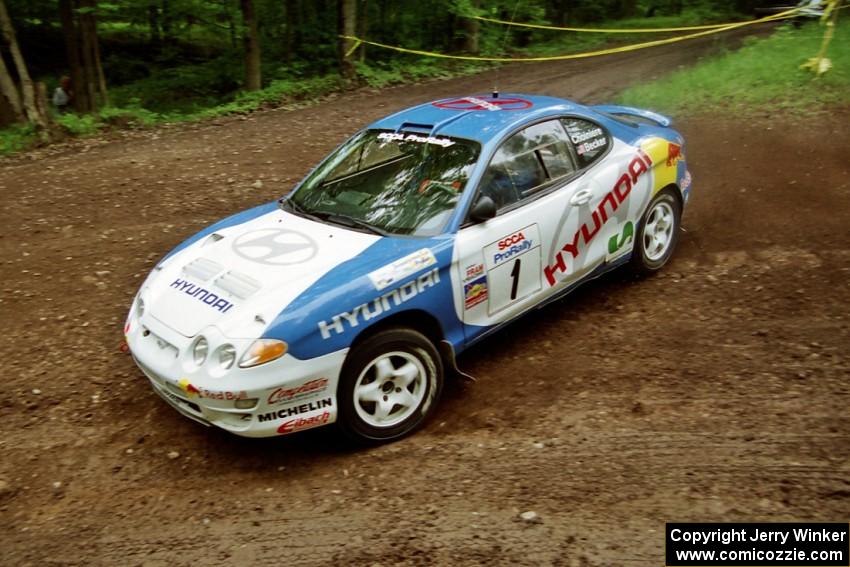 Paul Choiniere / Jeff Becker Hyundai Tiburon at the first hairpin on Colton Stock, SS5.