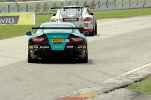 Nick Mancuso's Maserati GrandTurismo MC chases Buz McCall's Porsche Cayman