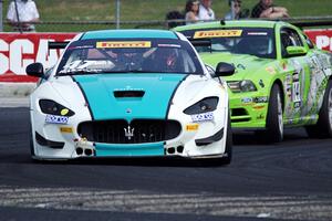 Gianmarco Raimondo's Maserati GrandTurismo MC and Nate Stacy's Ford Mustang Boss 302