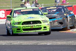 Nate Stacy's Ford Mustang Boss 302 and Tony Gaples' Chevy Camaro Z28