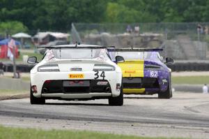 Nick Esayian's Aston Martin Vantage GT4 chases Mark Klenin's Aston Martin Vantage GT4