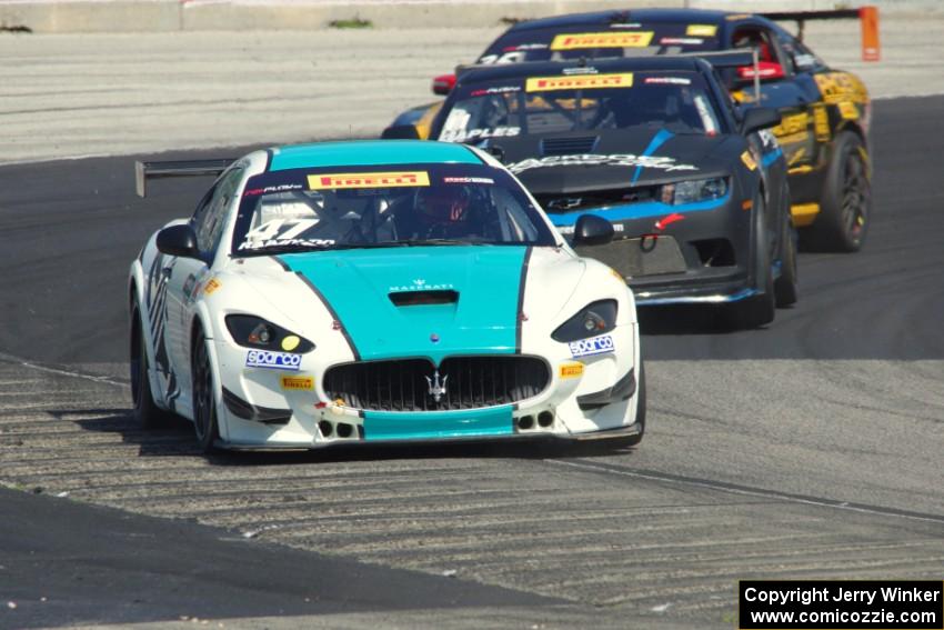 Gianmarco Raimondo's Maserati GrandTurismo MC, Tony Gaples' Chevy Camaro Z28 and Preston Calvert's Ford Mustang Boss 302