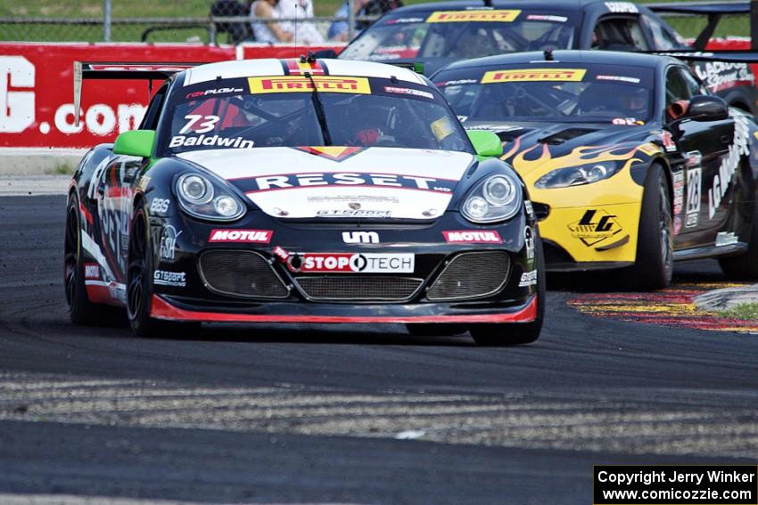 Jack Baldwin's Porsche Cayman, Lou Gigliotti's Aston Martin Vantage GT4 and Michael Cooper's Chevy Camaro Z28