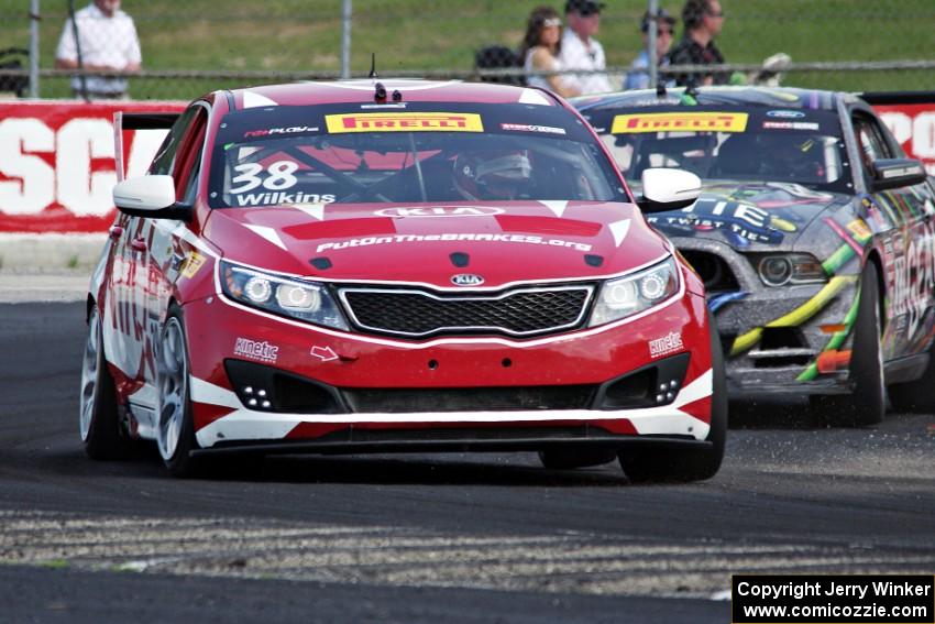 Mark Wilkins' Kia Optima and Dan Martinson's Ford Mustang Boss 302