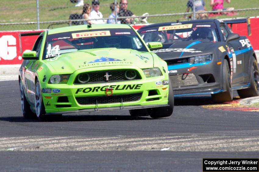 Nate Stacy's Ford Mustang Boss 302 and Tony Gaples' Chevy Camaro Z28