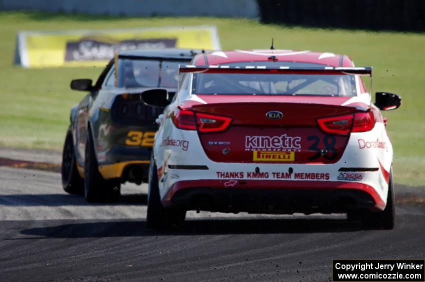 Andrew Aquilante's Ford Mustang Boss 302 and Mark Wilkins' Kia Optima