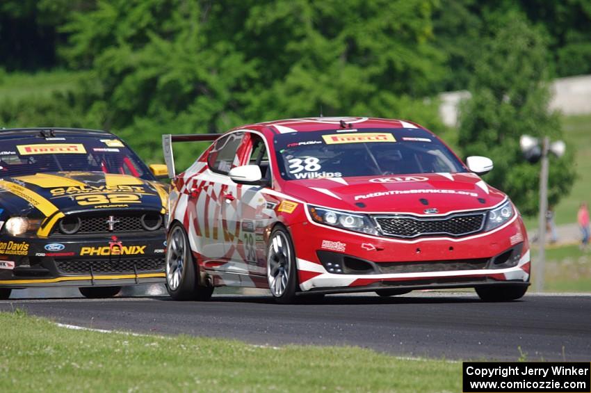 Mark Wilkins' Kia Optimaand Andrew Aquilante's Ford Mustang Boss 302